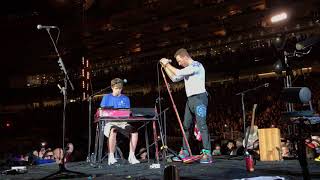 Coldplay inviting a fan to play O Fly On on stage [upl. by Yenahs]